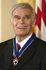 CHUCK WEARING THE PRESIDENTIAL MEDAL OF FREEDOM-2003
